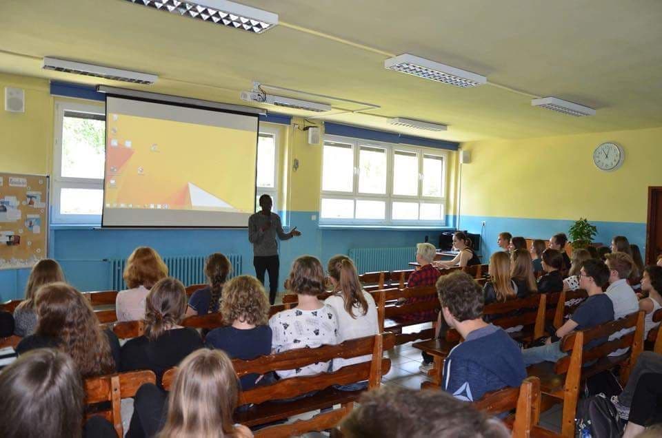Bertrand Ishimwe speaking to students abroad