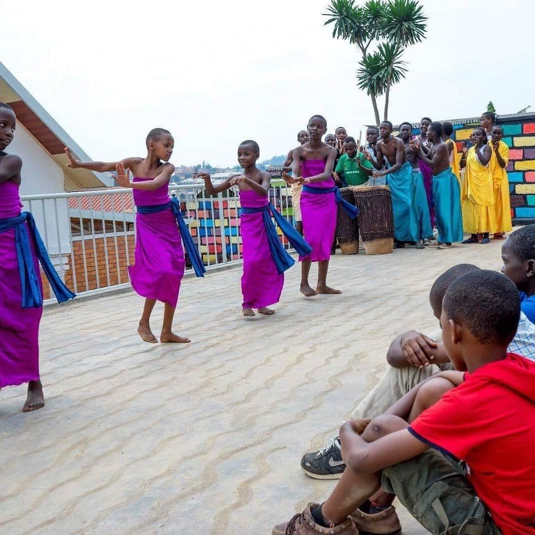 Irembo children performing a traditional Rwandan dance for visitors