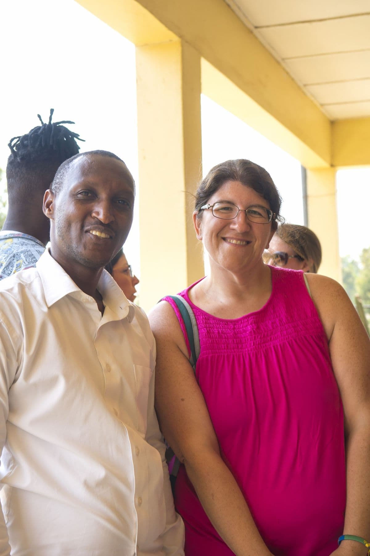 A visitor with an Irembo team member