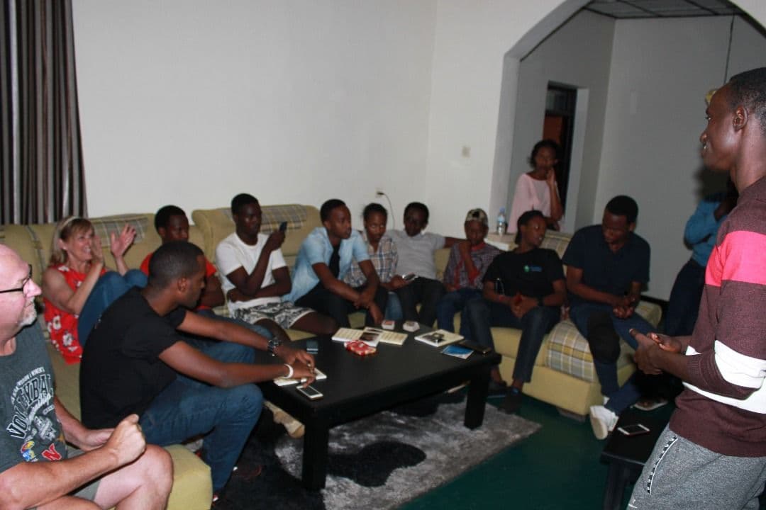 Irembo youth and visitors meeting together in the lounge